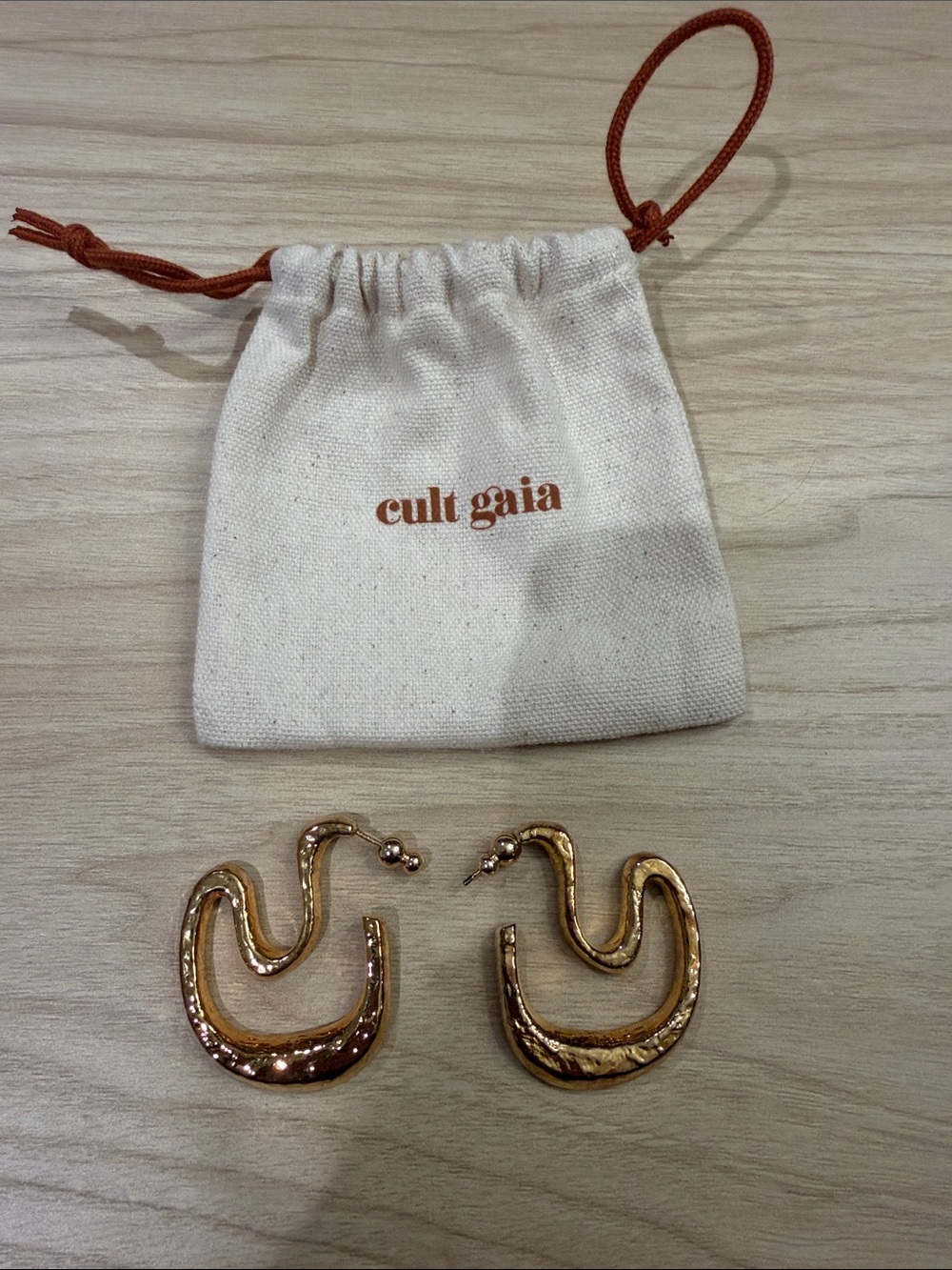 cult gaia Gold Sculpted Wave Hoop Earrings